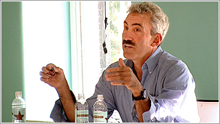 George Loewenstein speaking in a classroom